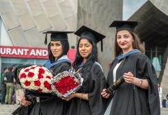 Students posing for a picture outside Lowry