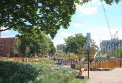 Play park among trees and landscaped path in Ancoats Manchester