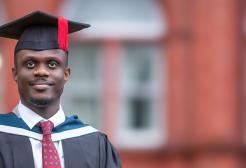 Charlton at graduation outside Peel Building