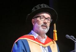 Craig delivers his speech on the Lowry stage