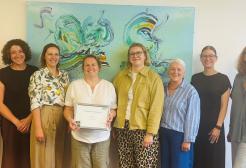 Melanie Stephens receiving the Chief Nursing Officer for Adult Social Care Gold Award