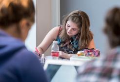 young white female student studying