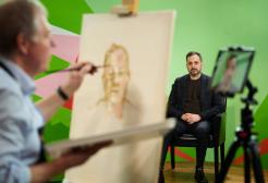 An artist does a portrait painting