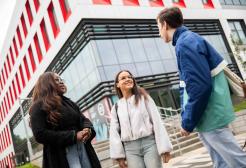 students outside SEE building