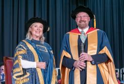 Chancellor Lucy Meacock and Honorary Fellow Mark Airey are pictured together at the University's graduation ceremony
