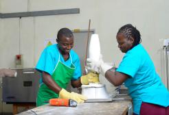 Two prosthetists working on a cast