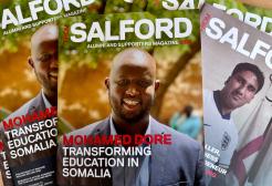 A pile of alumni magazines