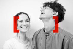 Two students laughing