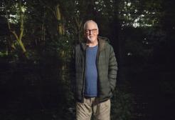 An image of a man stood outside 