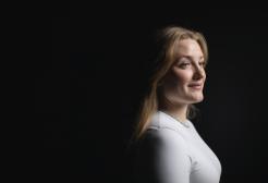 A headshot of a blonde lady