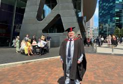 A man in graduation attire