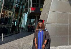 Opeyemi Victoria Ojekunle is pictured in her graduation cap and gown