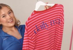 Sophie Whalley holding her DailyMova brand