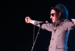 English performance poet John Cooper Clarke performing live on stage