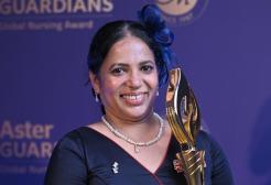 Dr Angimol Pradeep is pictured with her trophy