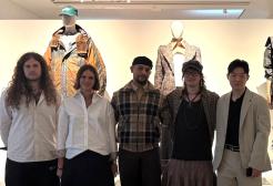 A group of University of Salford students in front of their designs at London Fashion Week