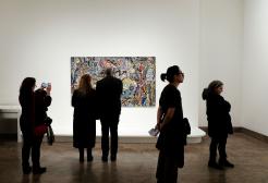 People are looking around an art gallery