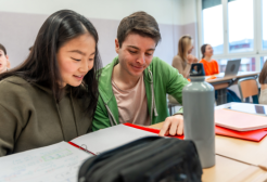 Two students studying in a classroom