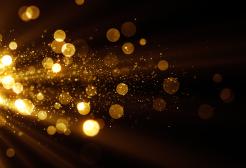 Decorative image of gold sparkles