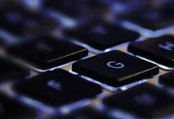 Backlit keyboard highlighting the G key