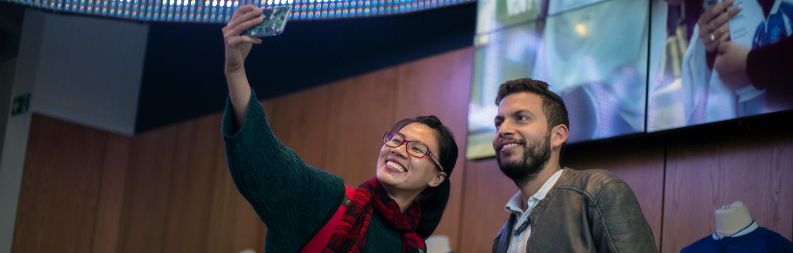 Two international salford students taking a selfie