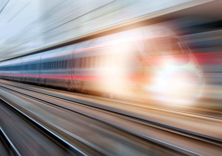 Blurred image speeding train 