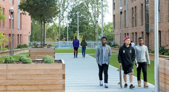 Students walking through student accommodation