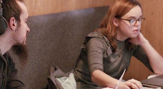 Students studying in a booth in the Library