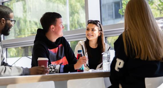 Students socializing in New Adelphi Cafe