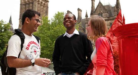 Three students meet outside Manchester Town Hall