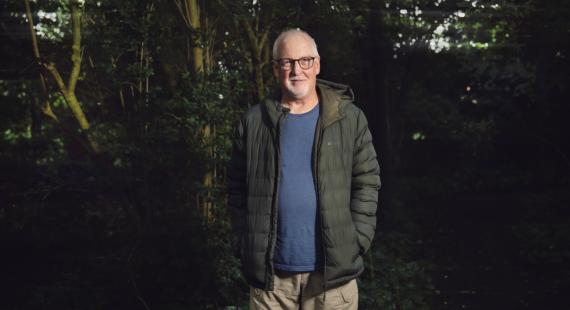 An image of a man stood outside 