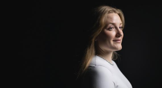 A headshot of a blonde lady