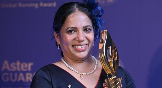 Dr Angimol Pradeep is pictured with her trophy
