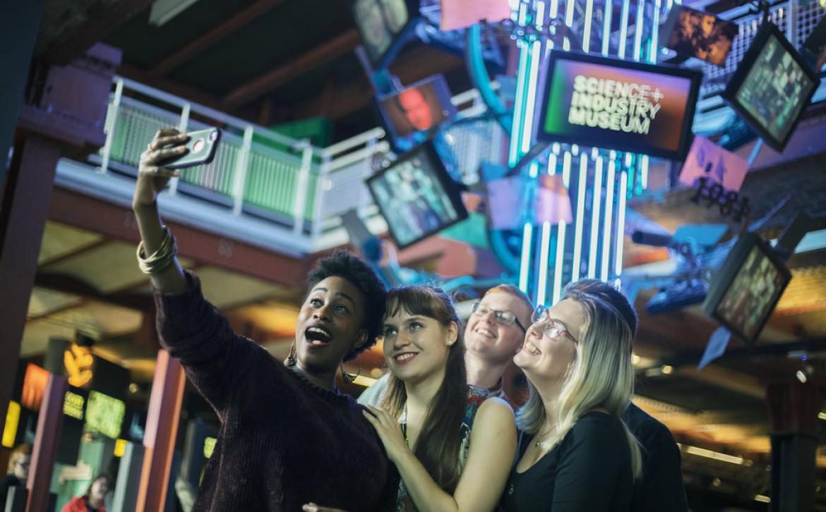 Students taking a selfie in the Museum of Science and Industry