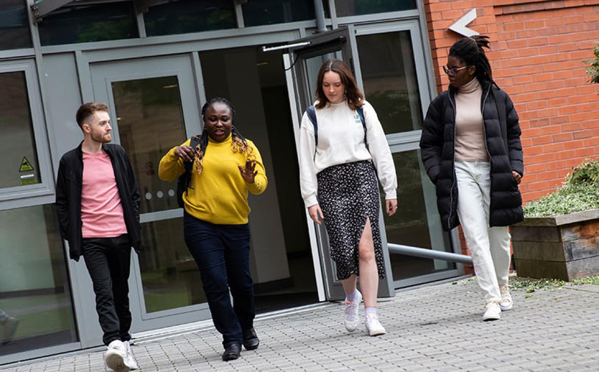 Students leaving Peel Park Quarter accommodation after a viewing