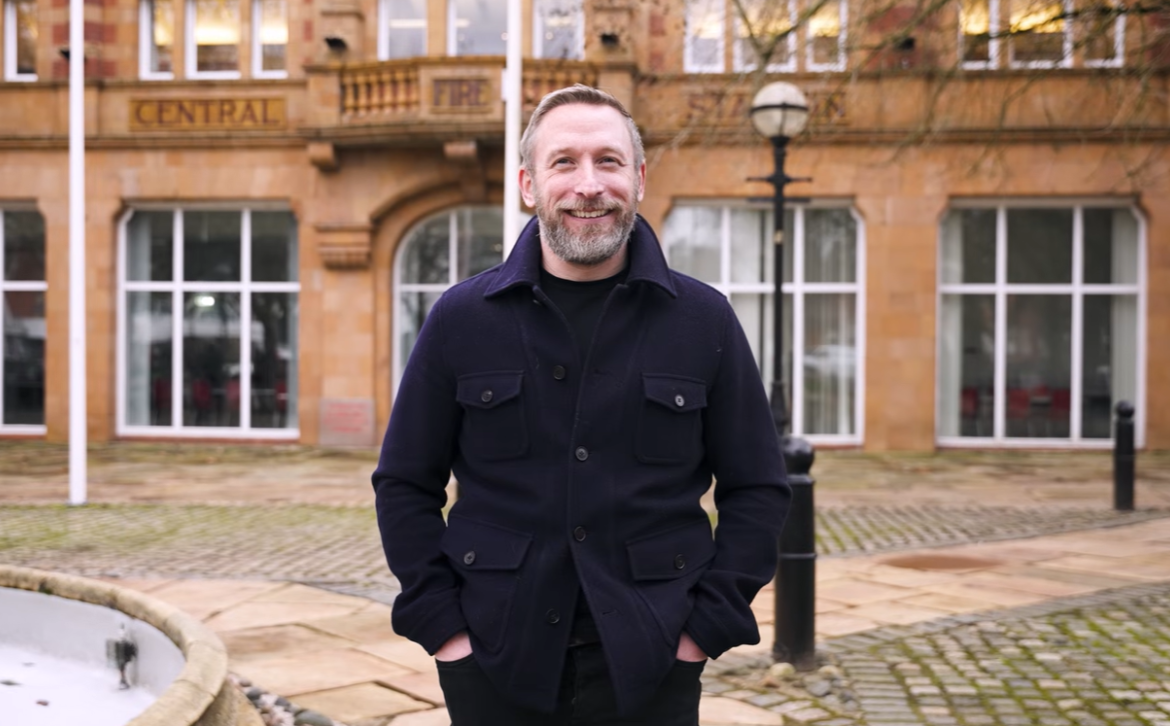 Mark Wantling standing in front of vice chancellor's office