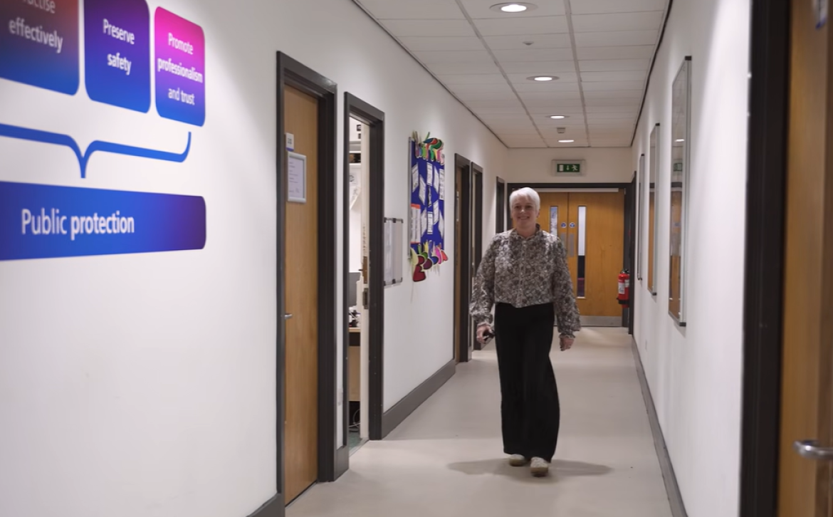 Vicky Halliwell standing in a corridor in a university building 